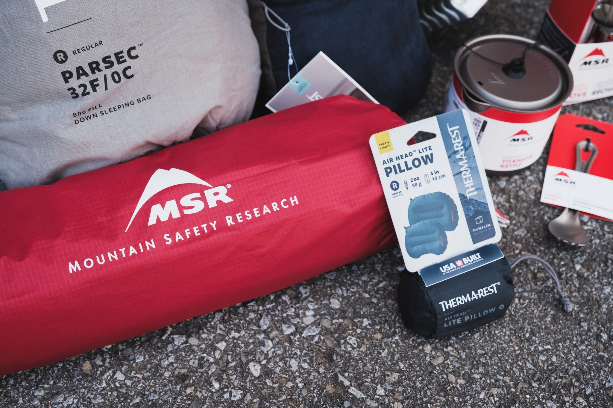 Assorted camping equipment including brands MSR and Thermarest
