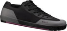 Black and gray sneaker with 'Hitzik' branding on a white background