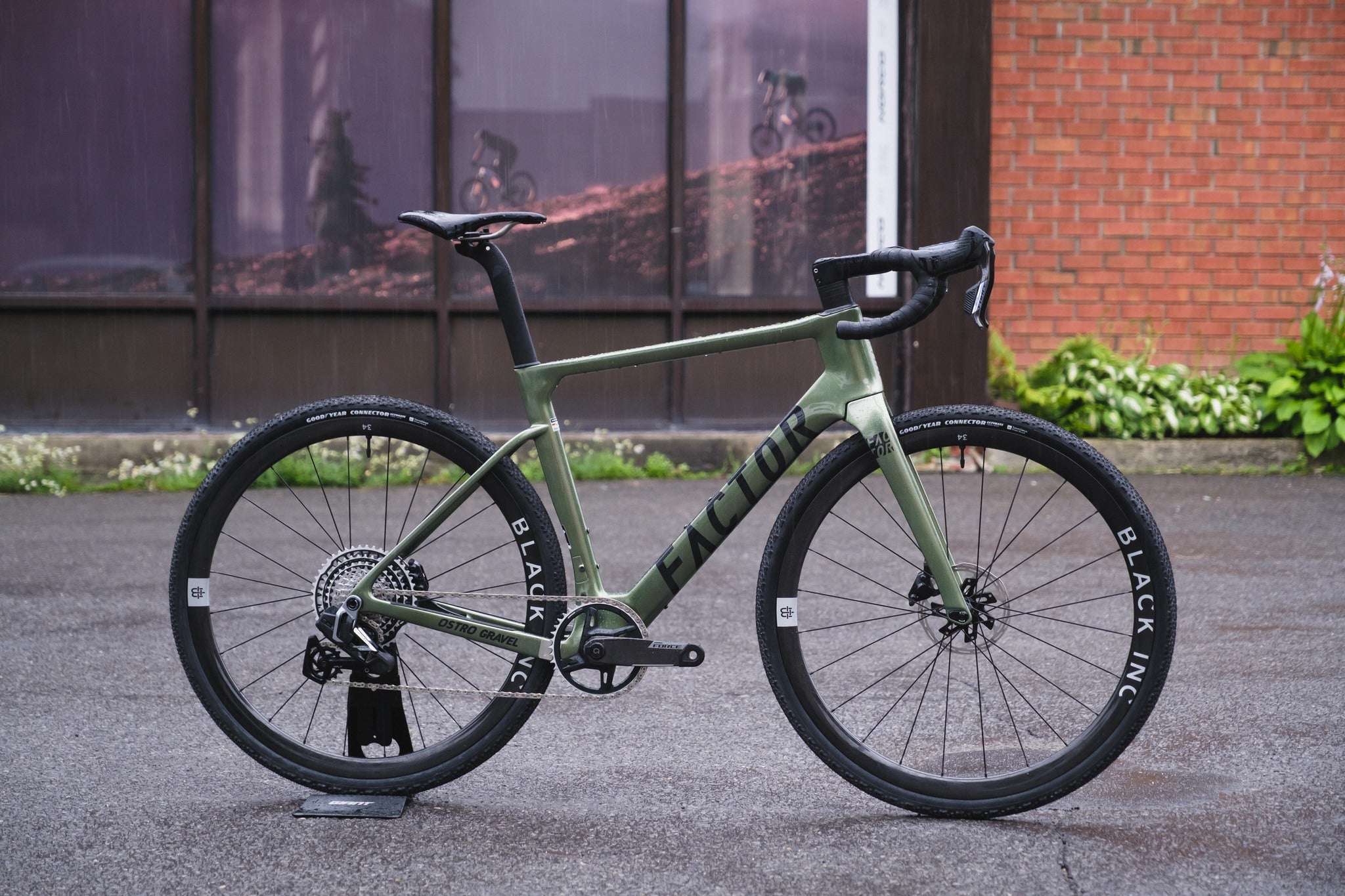 Factor Ostro Gravel bicycle with black tires in the Full Cycle parking lot 