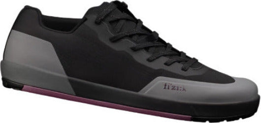 Black and gray sneaker with 'Hitzik' branding on a white background